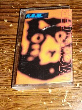 R.E.M.  - Monster on cassette (Warner Bros., 1994)